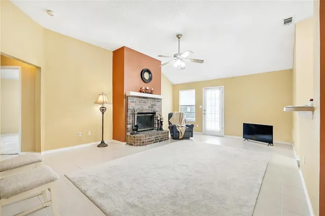 a bed room with a bed and a television