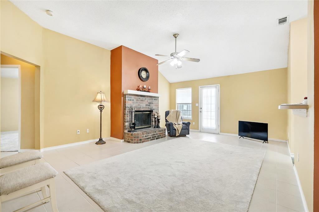 4609 Hunters Ridge Drive Sachse, TX 75048 - Photo 3 of 38 a bed room with a bed and a television