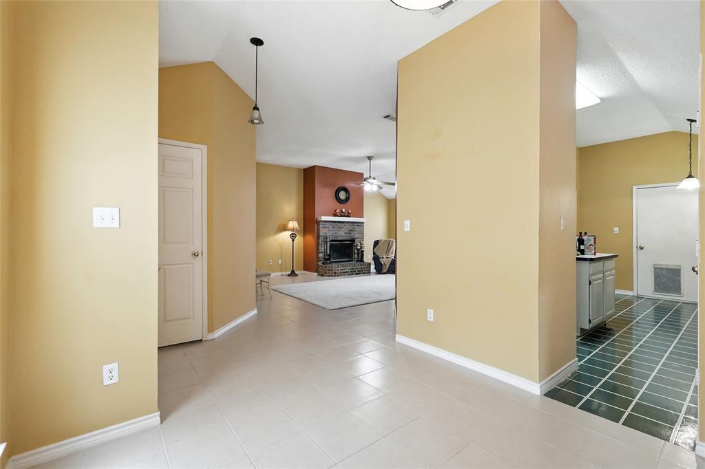 4609 Hunters Ridge Drive Sachse, TX 75048 - Photo 9 of 38 a view of a bathroom from a hallway