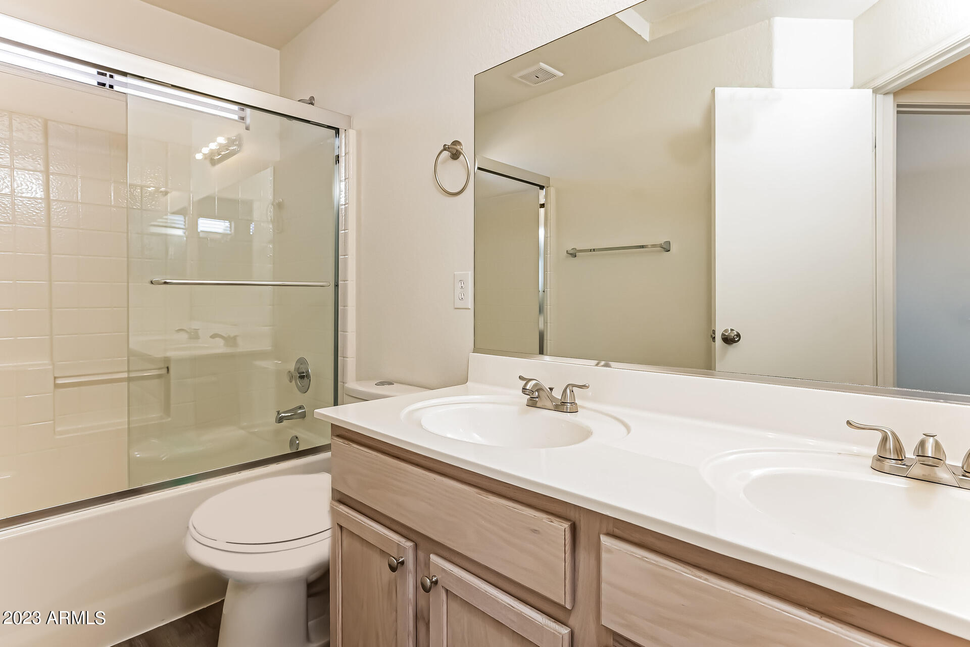 20247 North 34th Street Phoenix, AZ 85050 - Photo 13 of 17 a bathroom with a sink toilet and shower