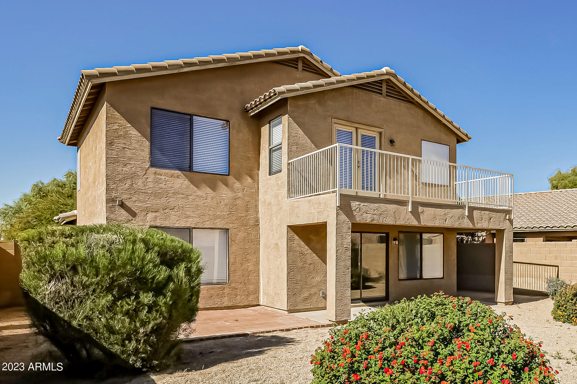 20247 North 34th Street Phoenix, AZ 85050 - Photo 15 of 17 a front view of a house with a yard