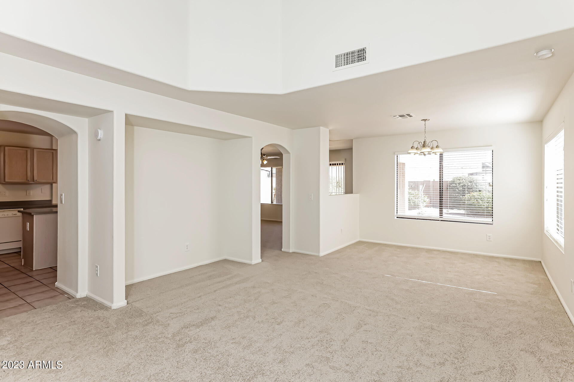 20247 North 34th Street Phoenix, AZ 85050 - Photo 2 of 17 a view of an empty room with a window