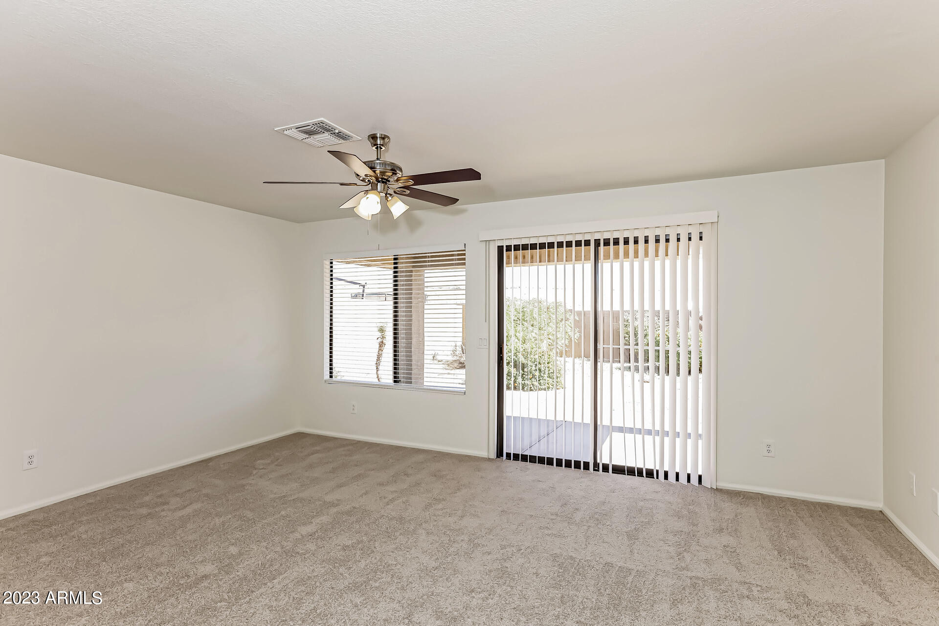 20247 North 34th Street Phoenix, AZ 85050 - Photo 3 of 17 a view of an empty room with a window