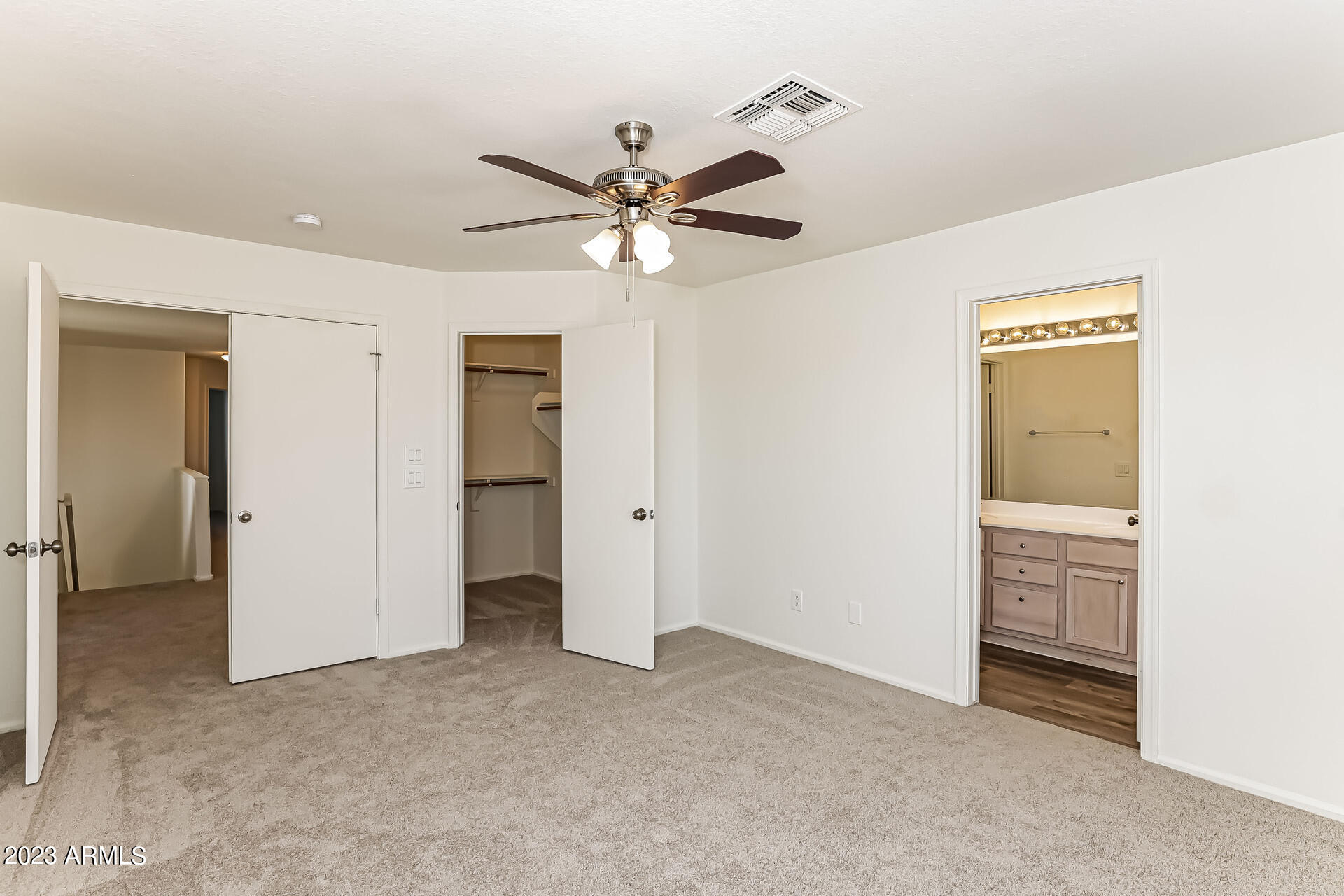 20247 North 34th Street Phoenix, AZ 85050 - Photo 6 of 17 a view of an empty room and closet area