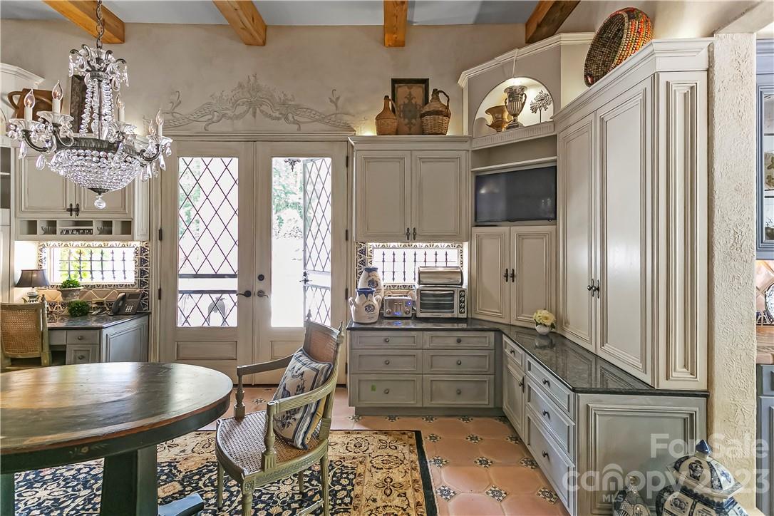 8371 Providence Road Charlotte, NC 28277 - Photo 28 of 48 a kitchen with furniture and window