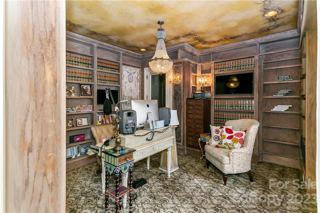 8371 Providence Road Charlotte, NC 28277 - Photo 37 of 48 a living room with fireplace furniture and a potted plant