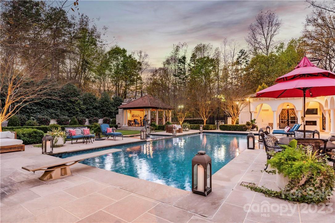 8371 Providence Road Charlotte, NC 28277 - Photo 4 of 48 an outdoor space with pool and furniture