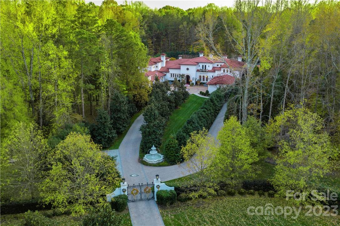 8371 Providence Road Charlotte, NC 28277 - Photo 6 of 48 an aerial view of a house with a yard