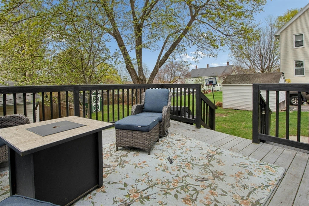 5 Elm Street Northbridge, MA 01588 - Photo 14 of 23 a view of balcony with wooden floor and outdoor seating