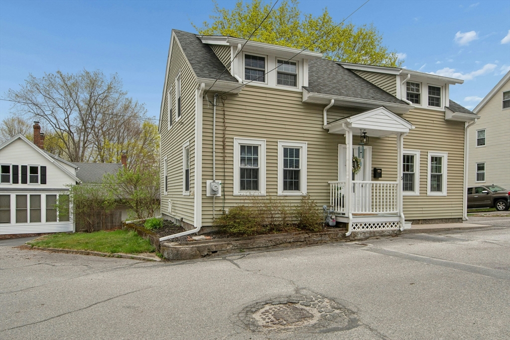 5 Elm Street Northbridge, MA 01588 - Photo 22 of 23 a front view of a house with a garage