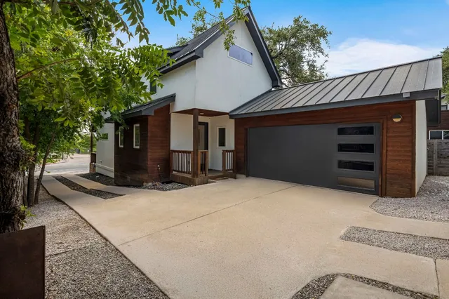 a front view of house with garage
