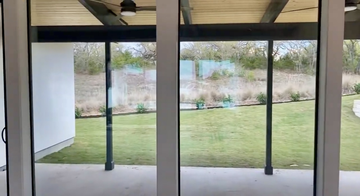 179 Shawnee Trail Dripping Springs, TX 78620 - Photo 6 of 17 a view of backyard from window