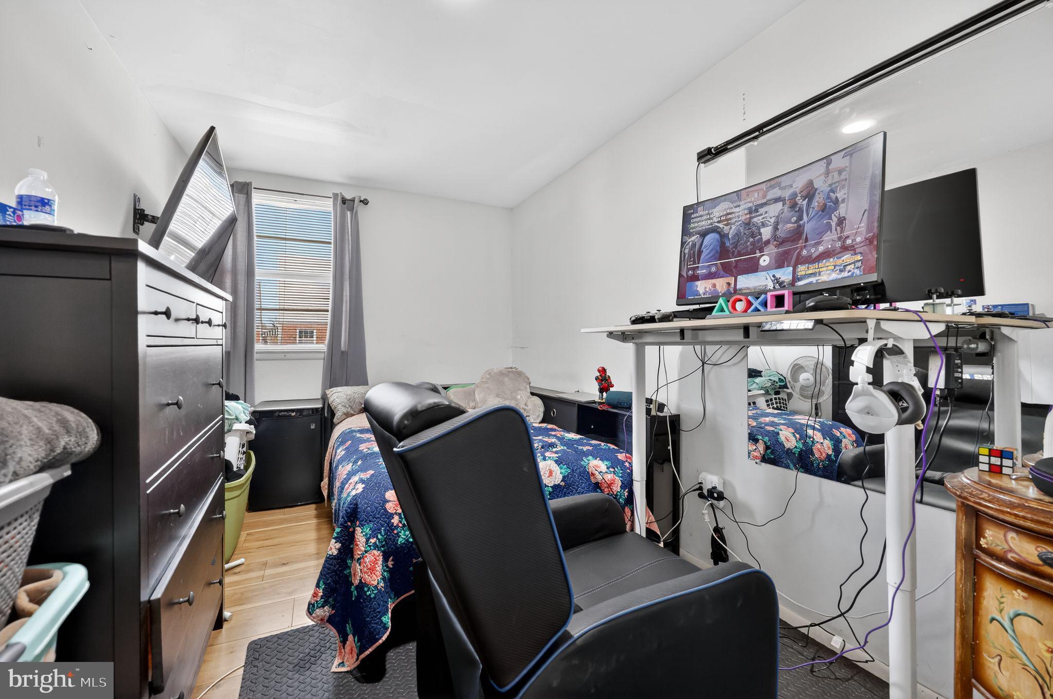 9766 Hilspach Street Philadelphia, PA 19115 - Photo 11 of 30 a room with furniture and flat screen tv
