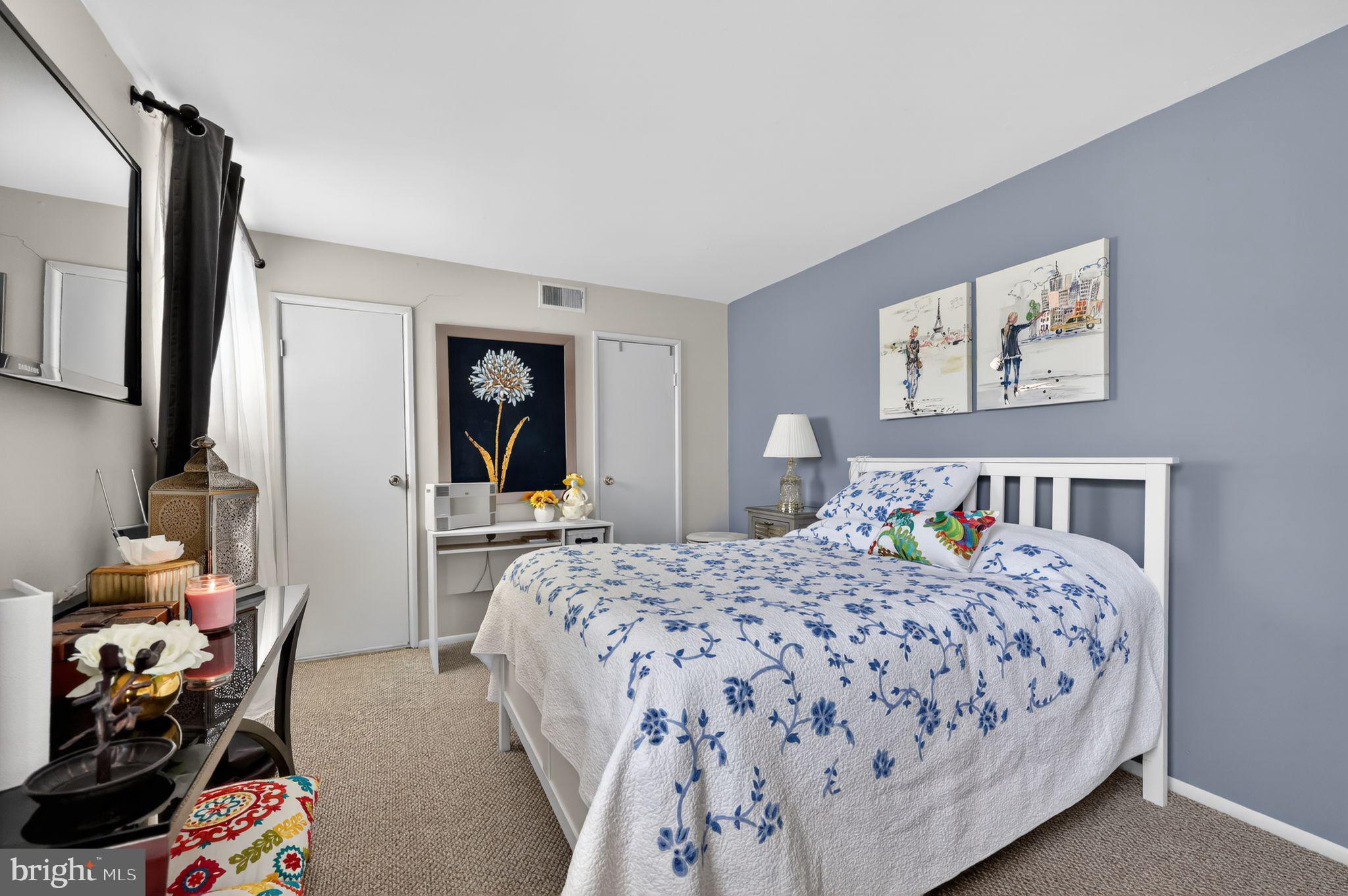 9766 Hilspach Street Philadelphia, PA 19115 - Photo 23 of 30 a bedroom with a bed and wooden floor