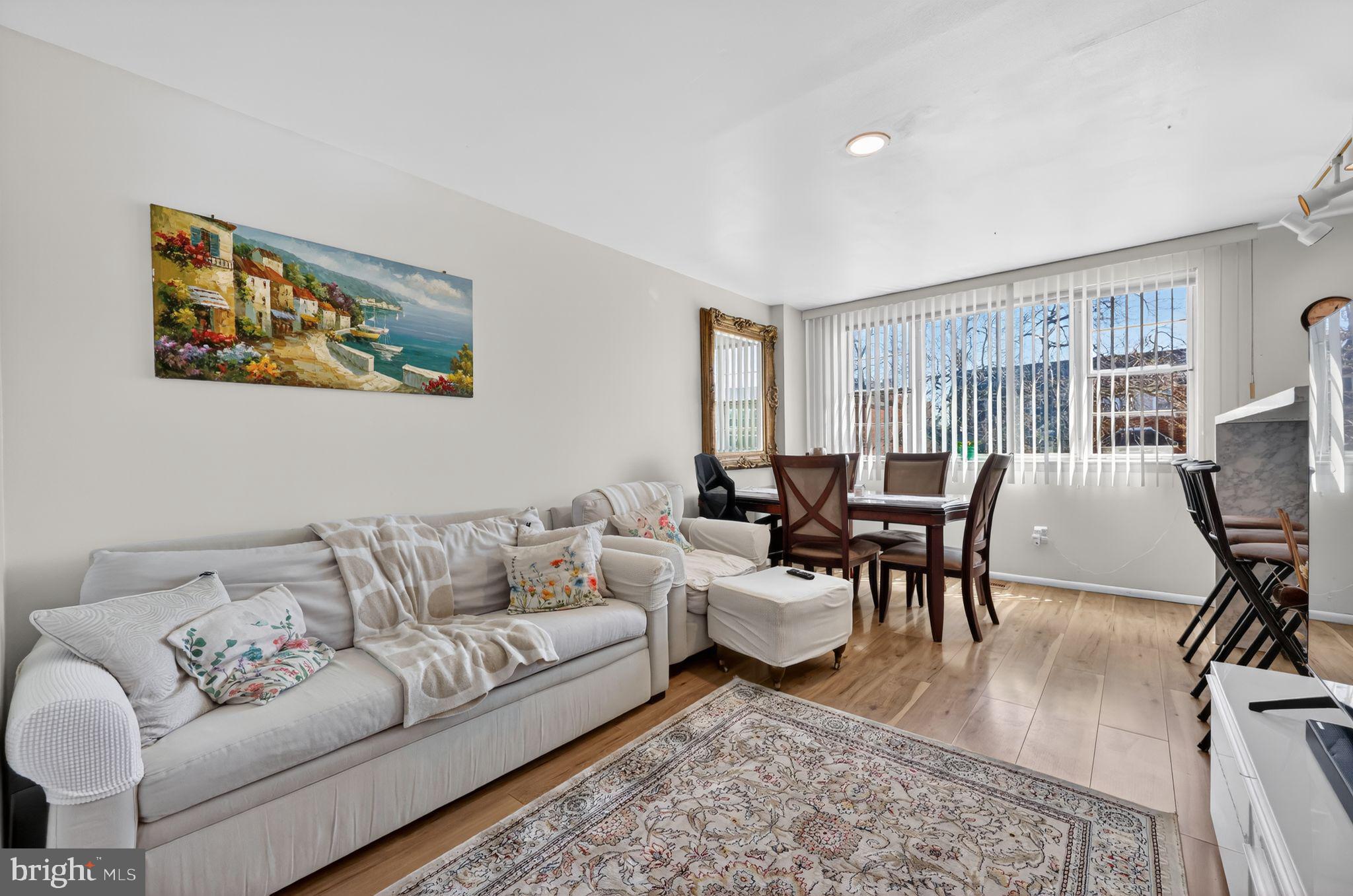 9766 Hilspach Street Philadelphia, PA 19115 - Photo 4 of 30 a living room with furniture wooden floor and a table