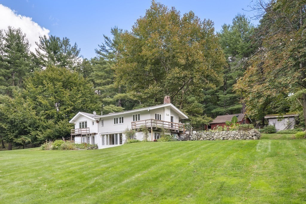 65 Old County Road Waltham, MA 02451 - Photo 3 of 42 a view of a house with a big yard