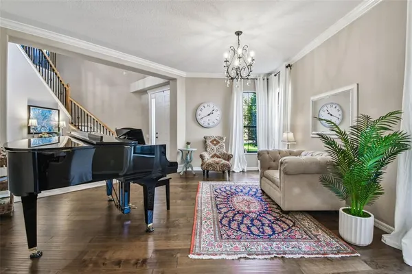 a kitchen with stainless steel appliances a refrigerator sink and microwave