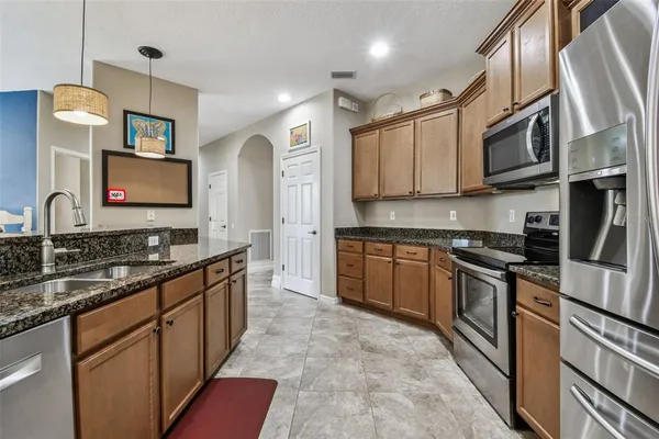 a bed room with a bed and a television