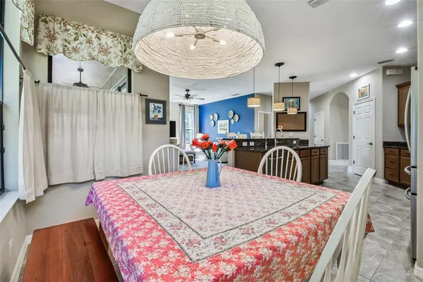 a bathroom with a granite countertop sink mirror and shower