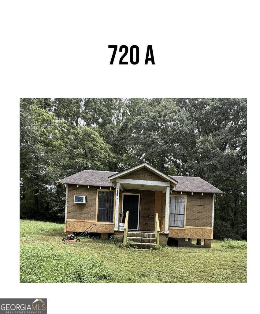 712 Searcy Avenue Griffin, GA 30223 - Photo 11 of 19 a front view of a house with a yard