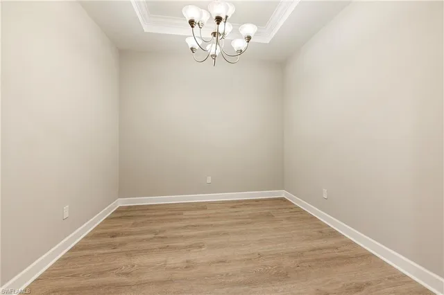 a view of wooden floor in an empty room