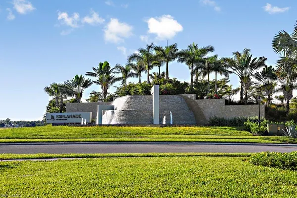 a view of swimming pool with outdoor seating and yard