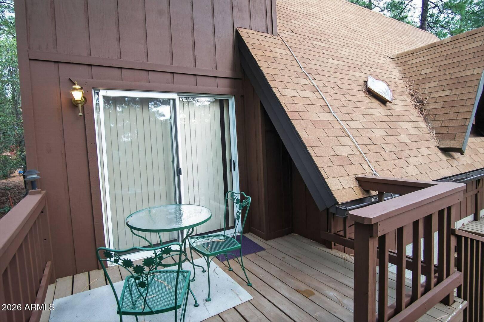 8884 Tonto Rim Drive Pine, AZ 85544 - Photo 43 of 43 a balcony with table and chairs