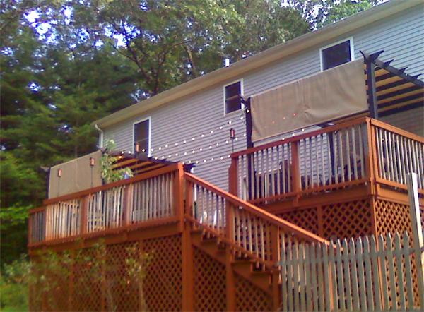 237 Kelly Road Northbridge, MA 01534 - Photo 14 of 22 a view of a wooden house with a deck
