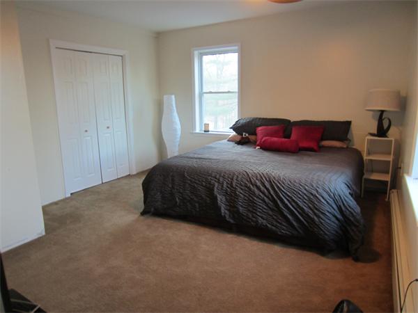 237 Kelly Road Northbridge, MA 01534 - Photo 17 of 22 a bedroom with a bed and window