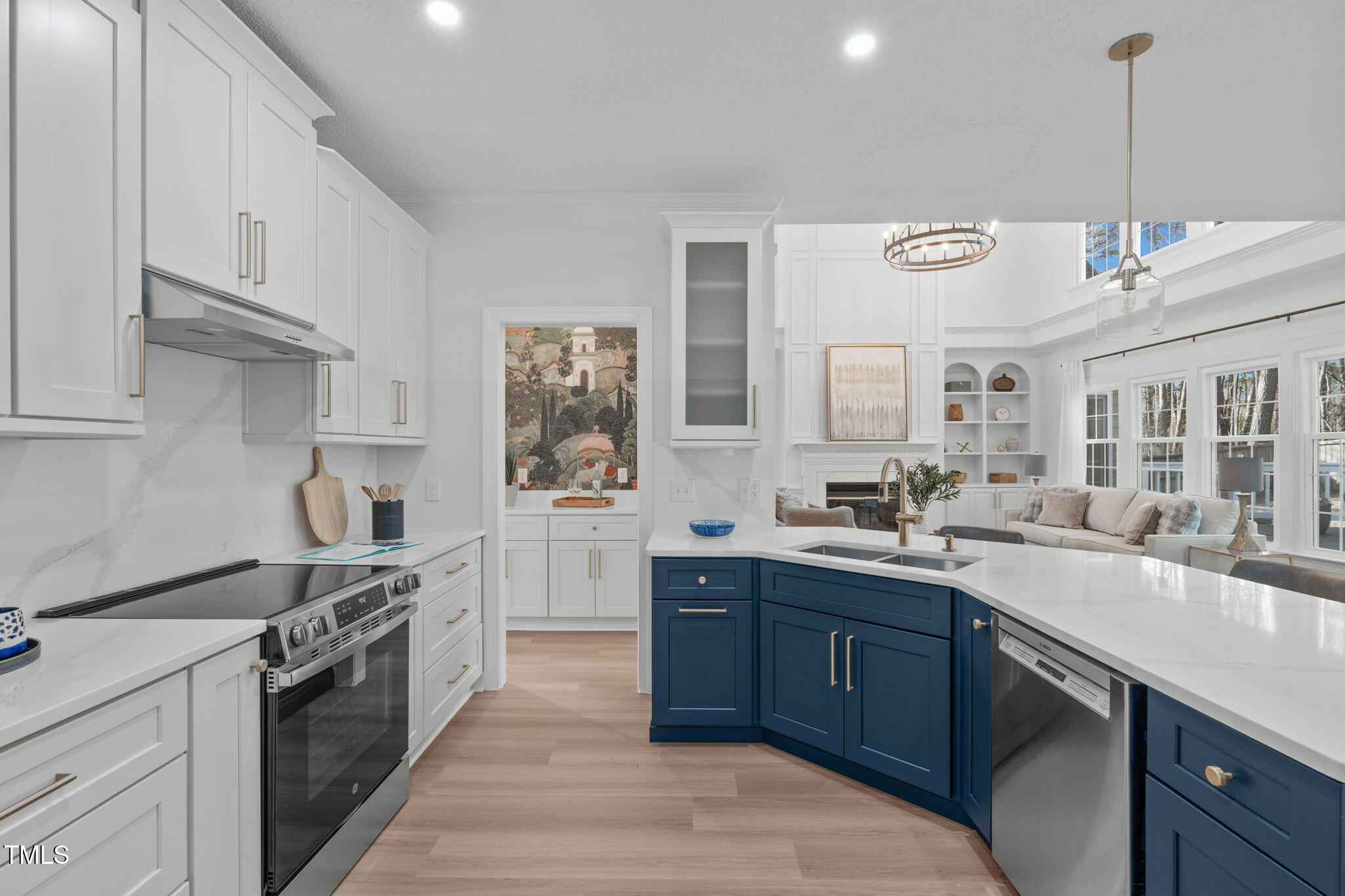 315 Barthel Drive Cary, NC 27513 - Photo 11 of 45 a kitchen with a sink stove and cabinets