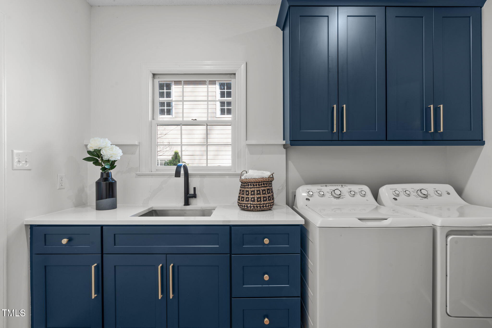 315 Barthel Drive Cary, NC 27513 - Photo 19 of 45 a utility room with closet dryer and washer