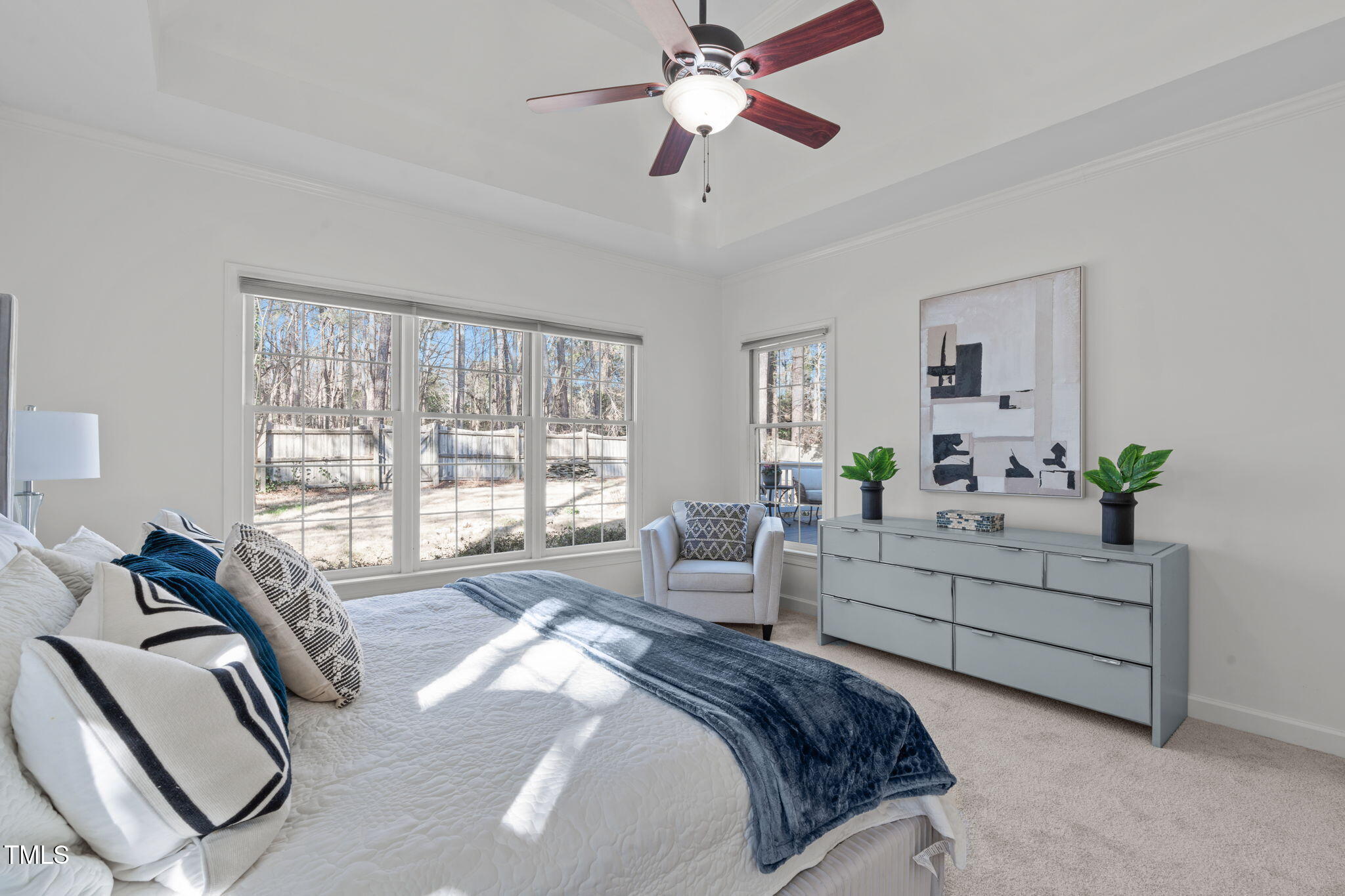 315 Barthel Drive Cary, NC 27513 - Photo 21 of 45 a spacious bedroom with a bed and a couch
