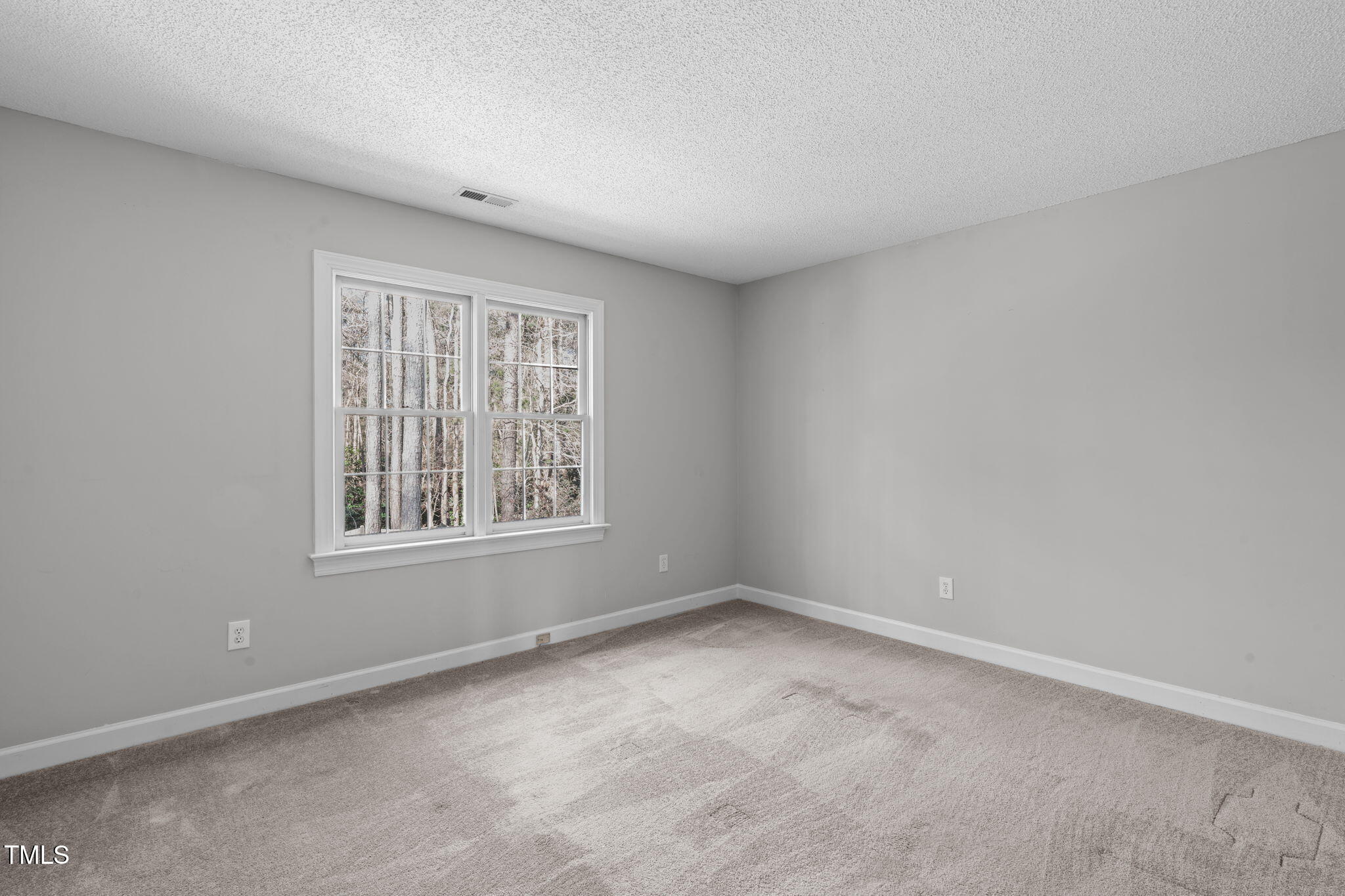 315 Barthel Drive Cary, NC 27513 - Photo 25 of 45 an empty room with a window