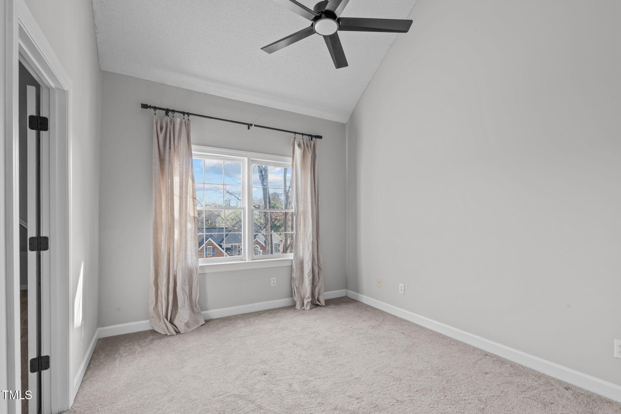 315 Barthel Drive Cary, NC 27513 - Photo 27 of 45 a view of room with a ceiling fan and window