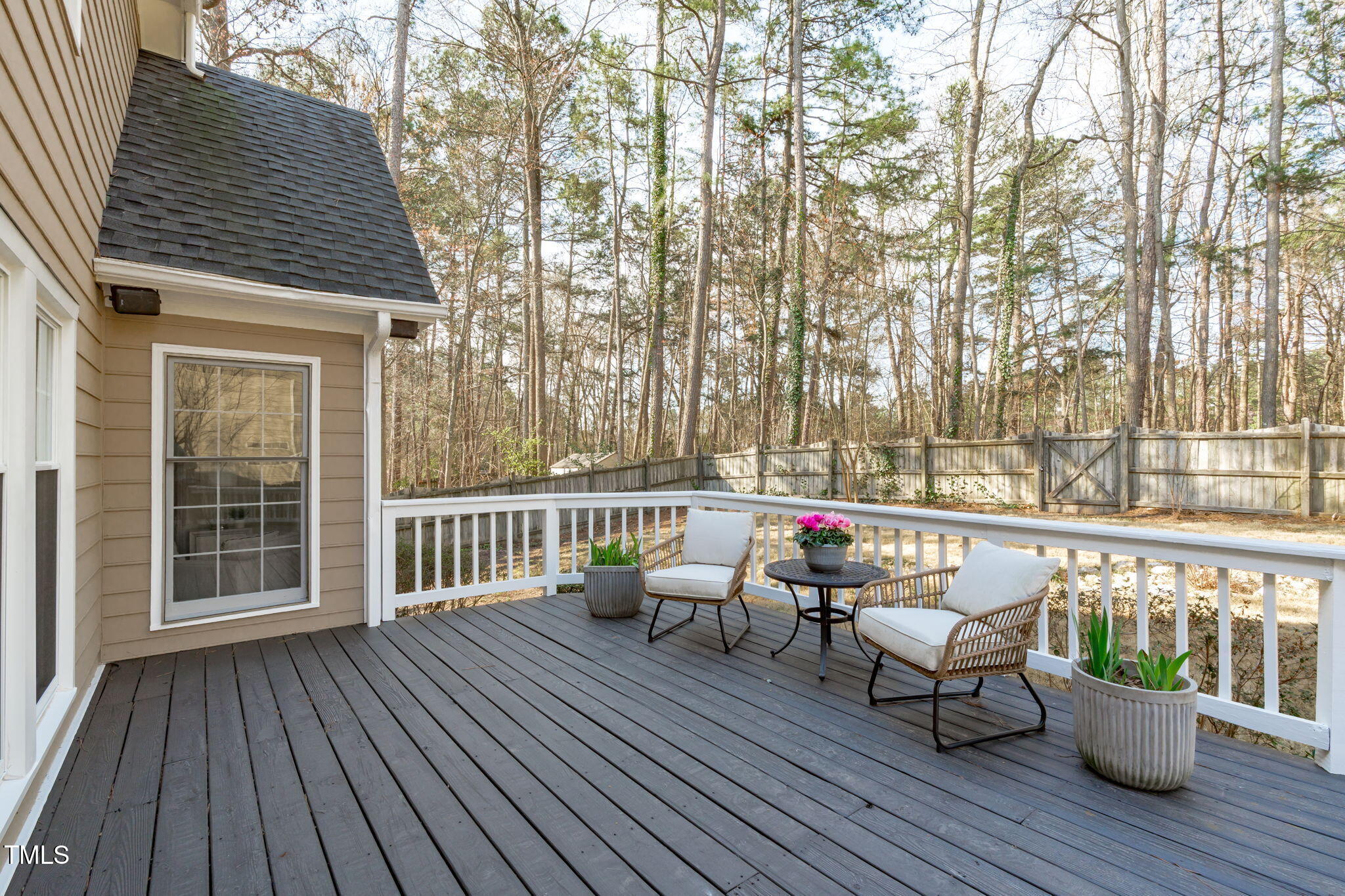 315 Barthel Drive Cary, NC 27513 - Photo 33 of 45 a balcony with wooden floor table and chairs