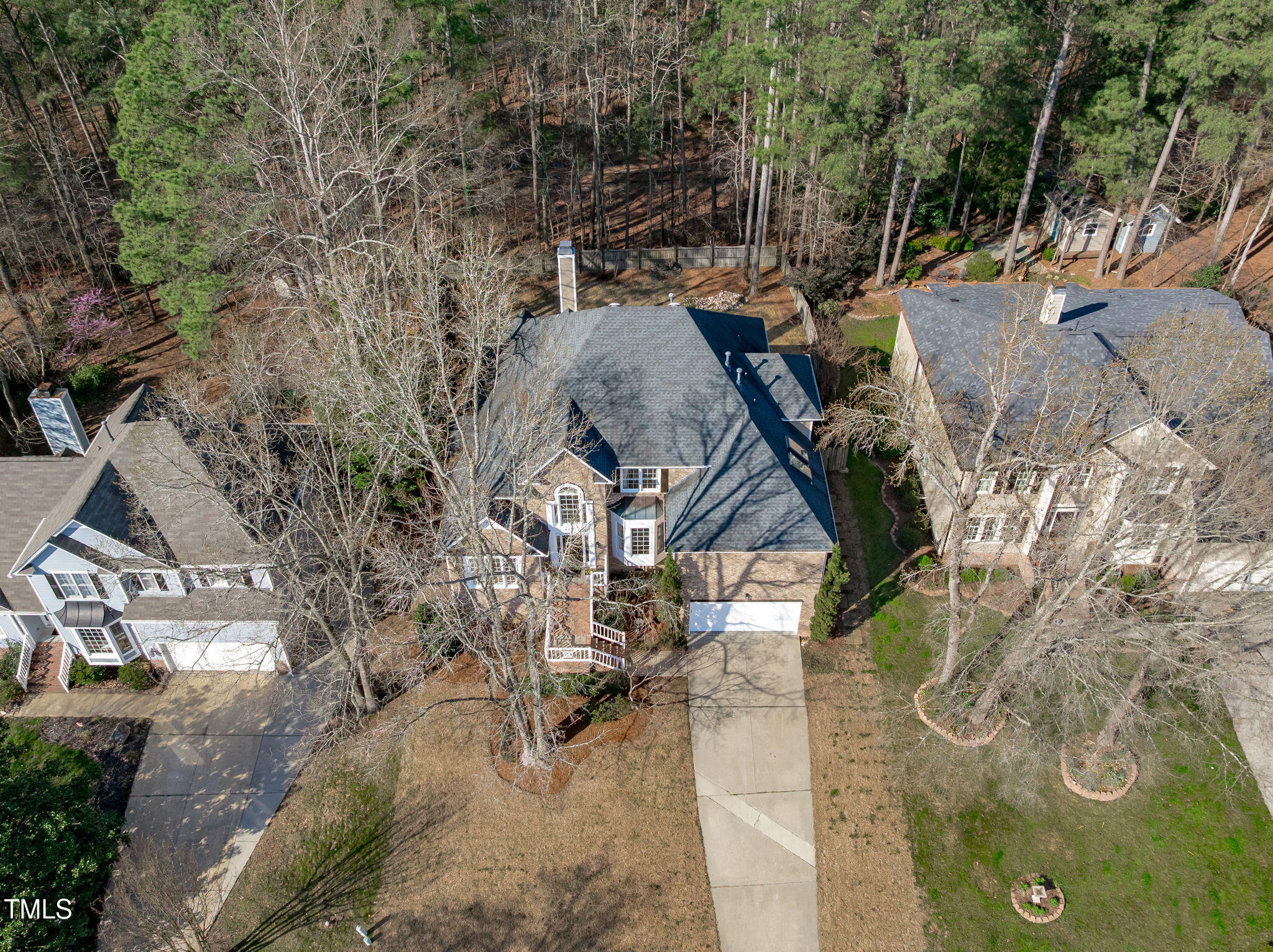 315 Barthel Drive Cary, NC 27513 - Photo 39 of 45 a view of a yard with plants and trees
