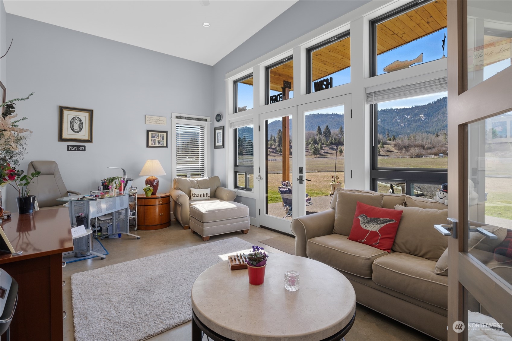 832 Pays Road Cle Elum, WA 98922 - Photo 19 of 25 a living room with furniture fireplace and a large window