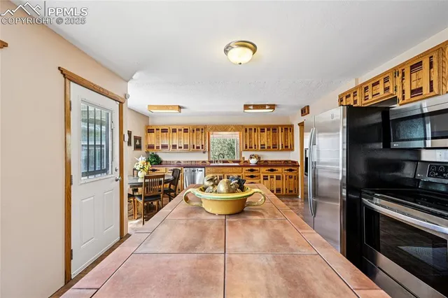 a bathroom with a sink a mirror and shower