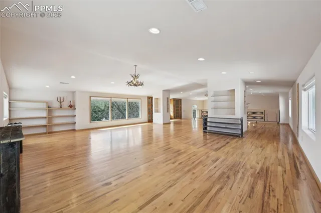 a view of livingroom with furniture and windows