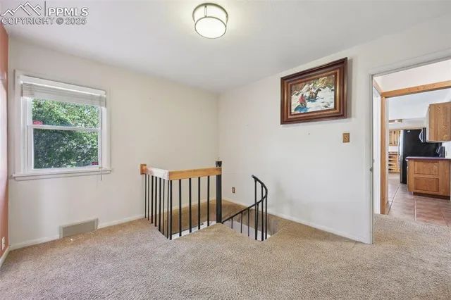 a view of an empty room with an empty space