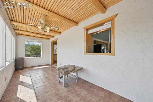 a kitchen with a stove a sink and a refrigerator