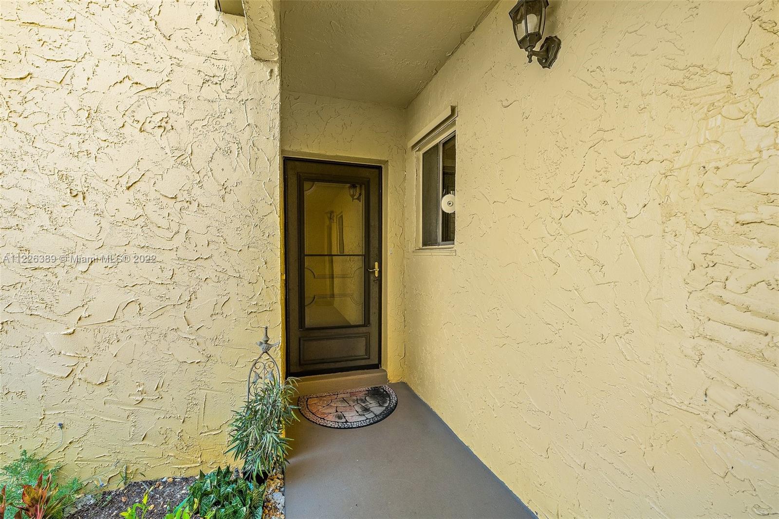 5335 Southeast Miles Grant Road, Unit 107 Stuart, FL 34997 - Photo 3 of 44 a view of a bathroom with a sink