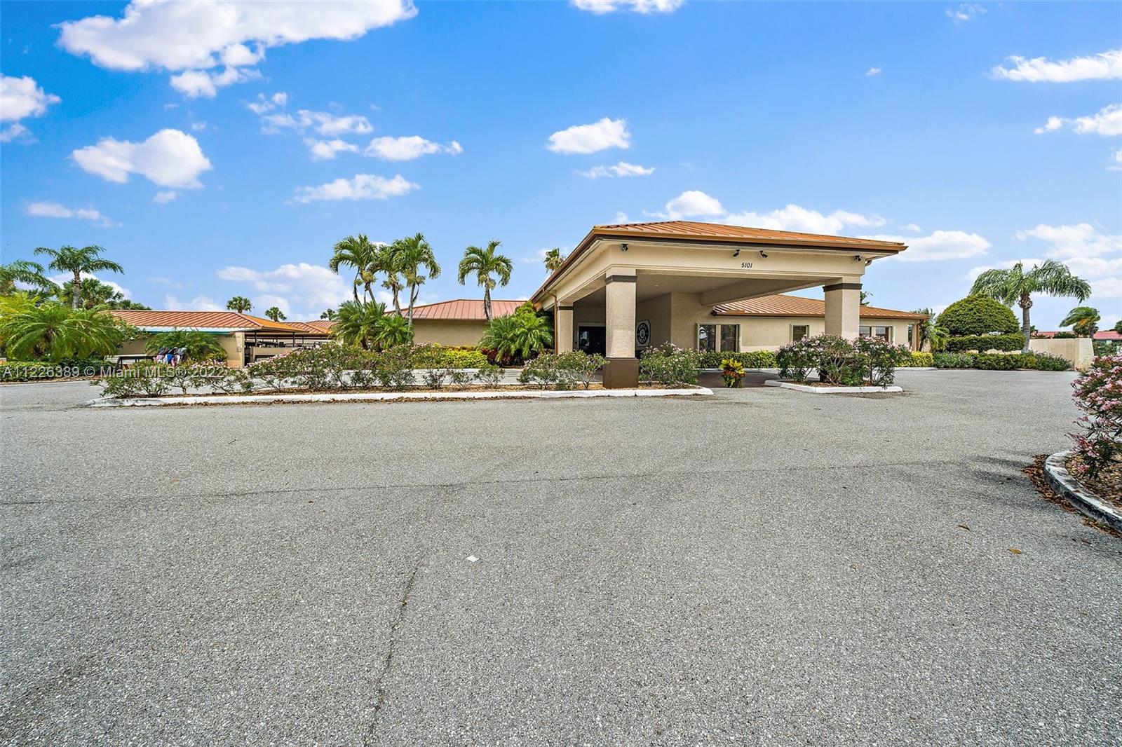 5335 Southeast Miles Grant Road, Unit 107 Stuart, FL 34997 - Photo 35 of 44 a view of a house with a outdoor space