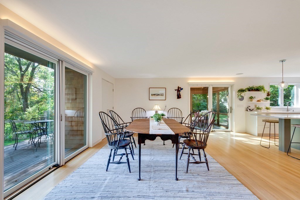 14 Baker Bridge Road Lincoln, MA 01773 - Photo 3 of 40 a view of a dining room with furniture window and wooden floor