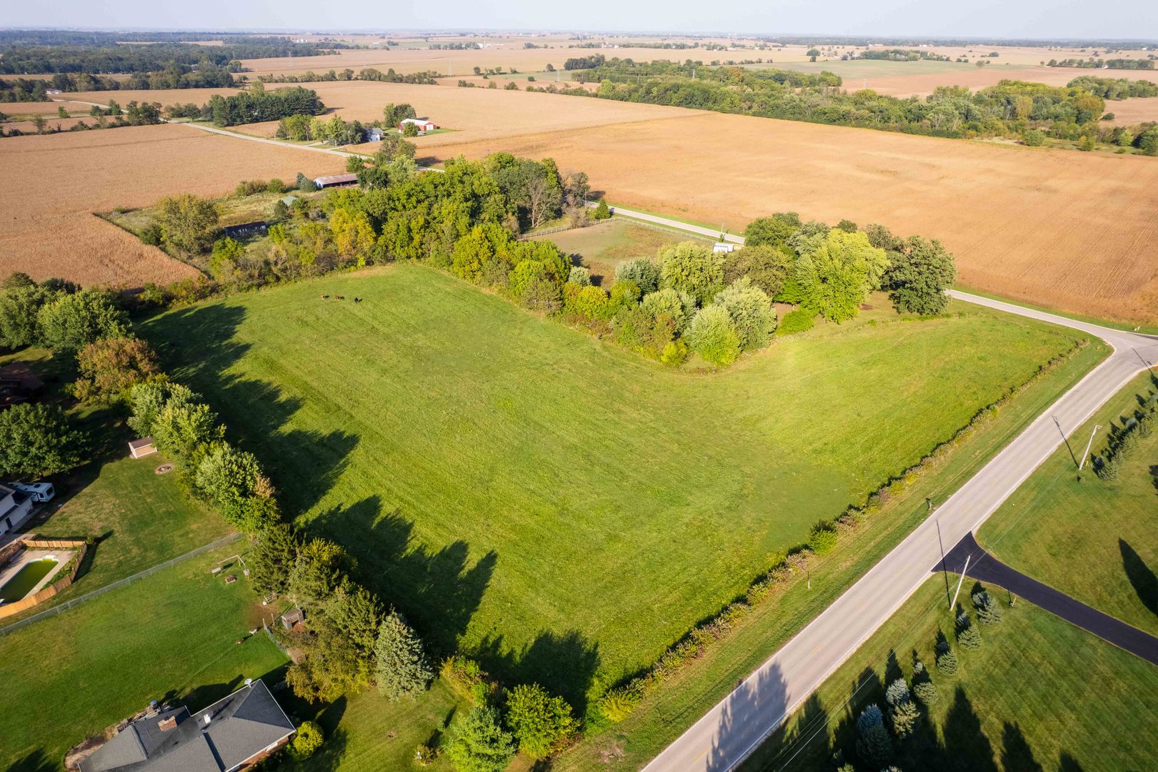 Lot Tbd North Grove Road Sycamore, IL 60178 - Photo 3 of 12 a view of a lake with a beach