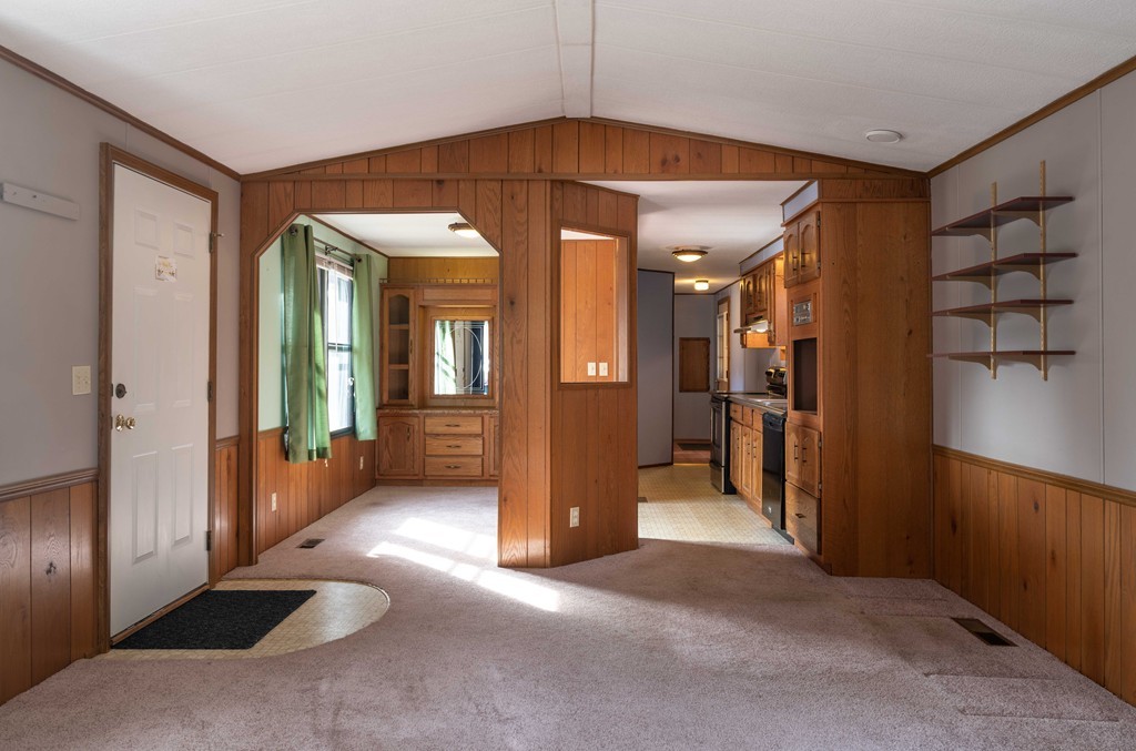 26 Gould Road Ware, MA 01082 - Photo 11 of 23 a view of a hallway with wooden shelves