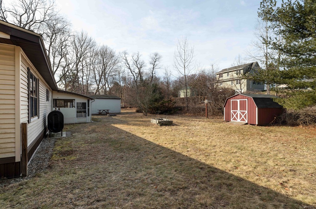 26 Gould Road Ware, MA 01082 - Photo 4 of 23 a view of a yard with a house