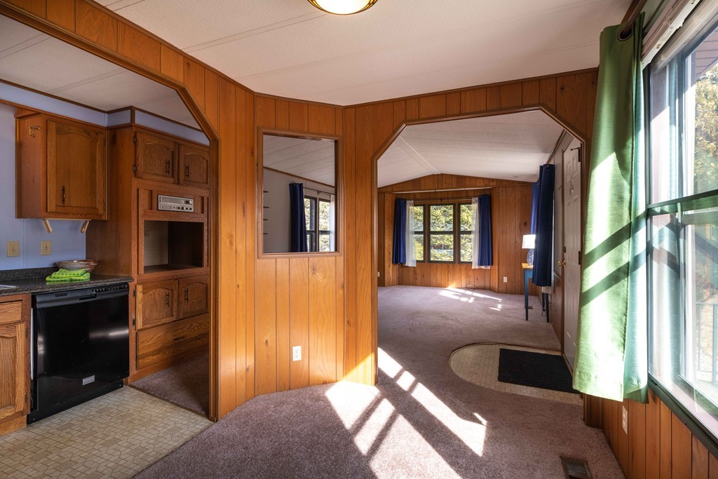 26 Gould Road Ware, MA 01082 - Photo 8 of 23 a living room with furniture and a fireplace