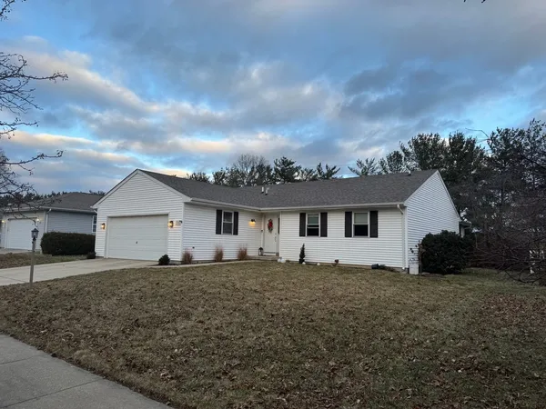 front view of house with a yard