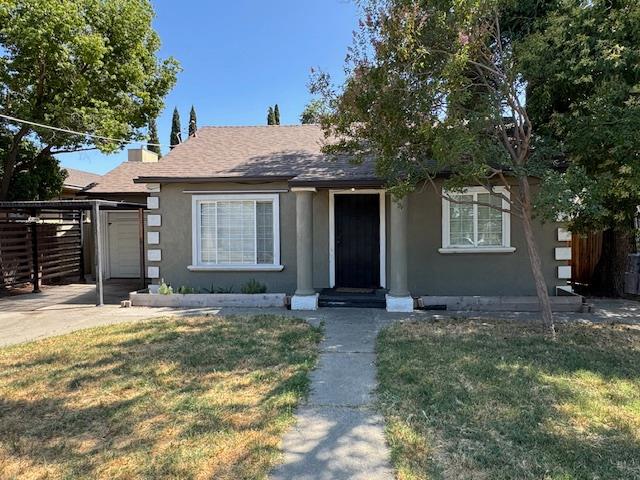 a house view with a garden space